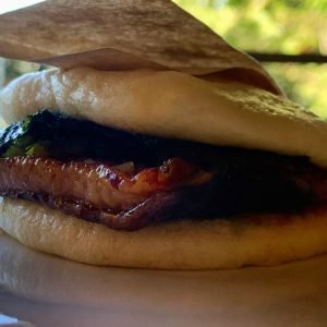 Steamed bun stuffed with eel marinated in Korean seaweed and ginger